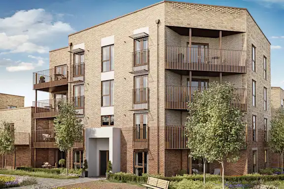 A row of houses with a car parked in front of the first house.
